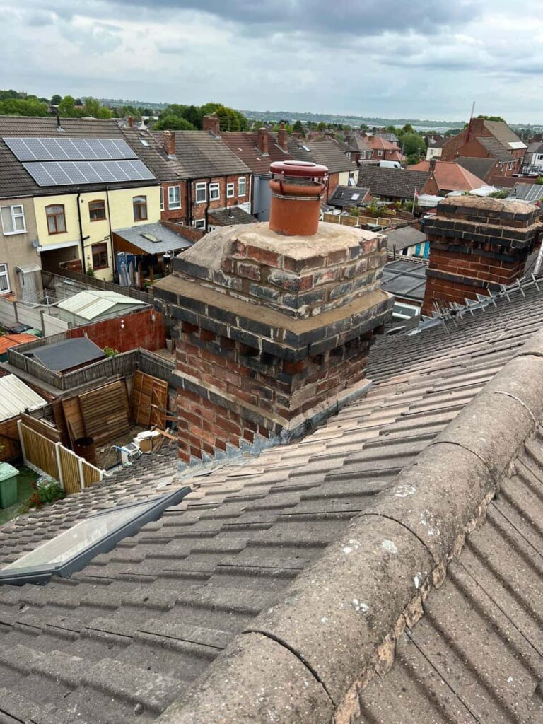 This is a photo taken from a roof which is being repaired by Worksop Roofing Repairs, it shows a street of houses, and their roofs